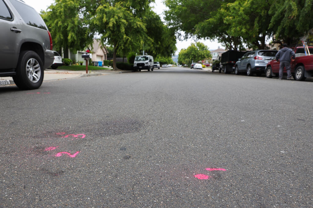 Evidence markings at the site of a shooting along Blacksmith Way in Santa Rosa on Sunday, June 25, 2023.  (Christopher Chung / The Press Democrat)