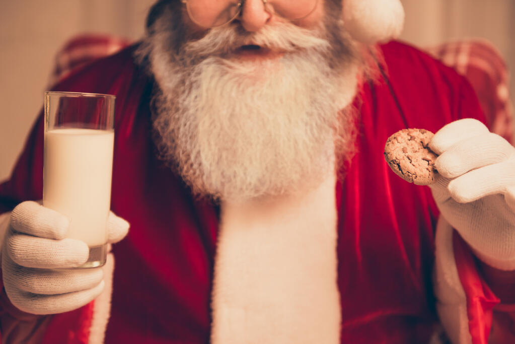 Reader questions whether Santa should be eating unrefridgerated milk and cookies from children he doesn’t know.