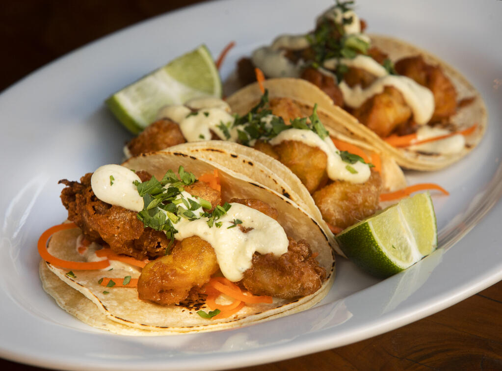 Tempura Fried Calamari Tacos with green chili crema and shredded carrots from Reel & Brand in Sonoma. (Photo by John Burgess/The Press Democrat)