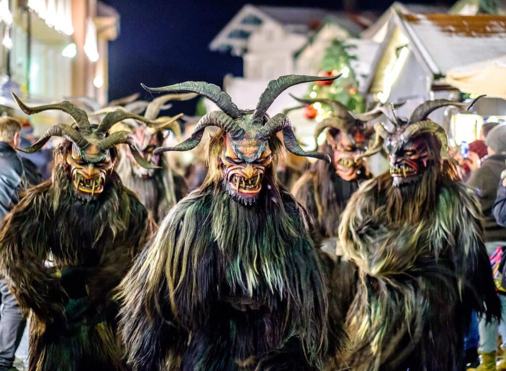SANTA'S LITTLE HELPERS - More costumed revellers, this time from the Krampus Paradew in Bad Toelz, Germany, from Dec. 9, 2017.