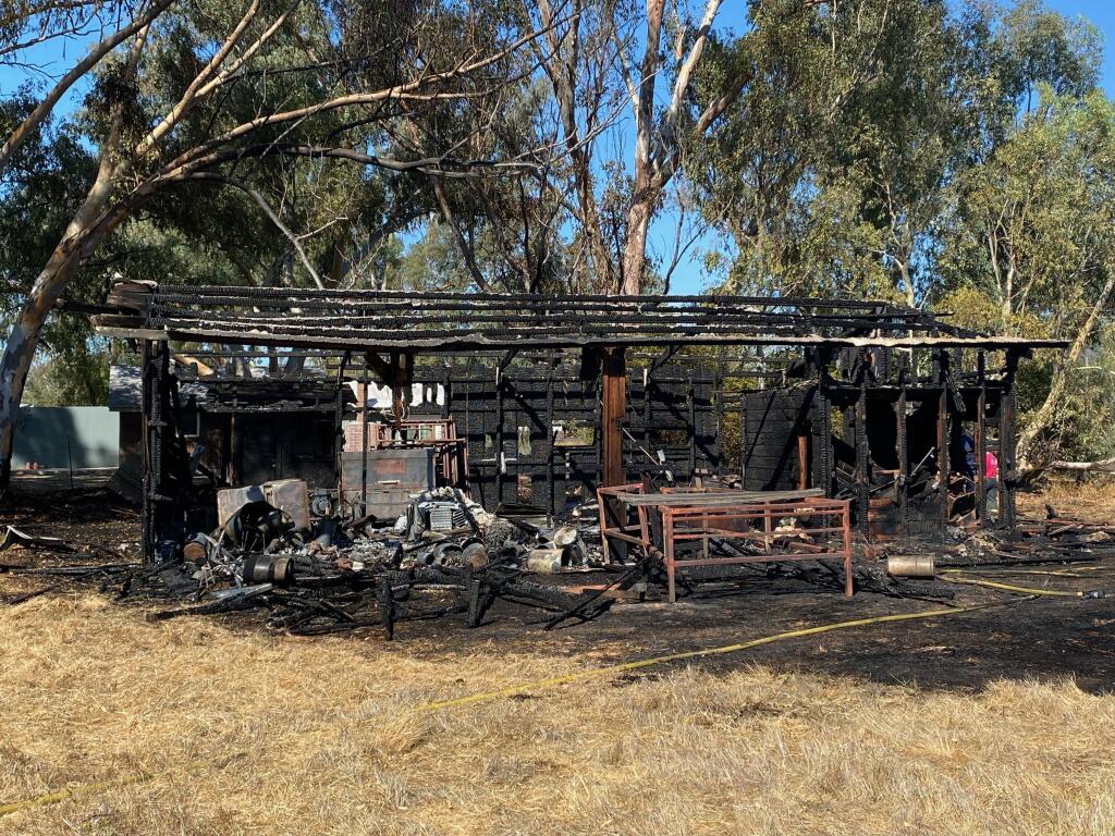 Sonoma Valley Fire District responded to a barn fire on Arnold Drive Wednesday afternoon and prevented the flames from spreading to vegetation or other buildings. (Photo courtesy of Sonoma Valley Fire Captain Gabe Stirnus)