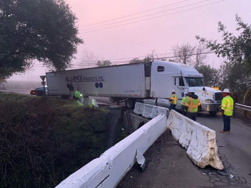 A big rig stuck on the Laughlin Road bridge prompted the closure of Laughlin Road north of River Road on Wednesday, Jan. 15, 2020. (CHP SANTA ROSA/ TWITTER)