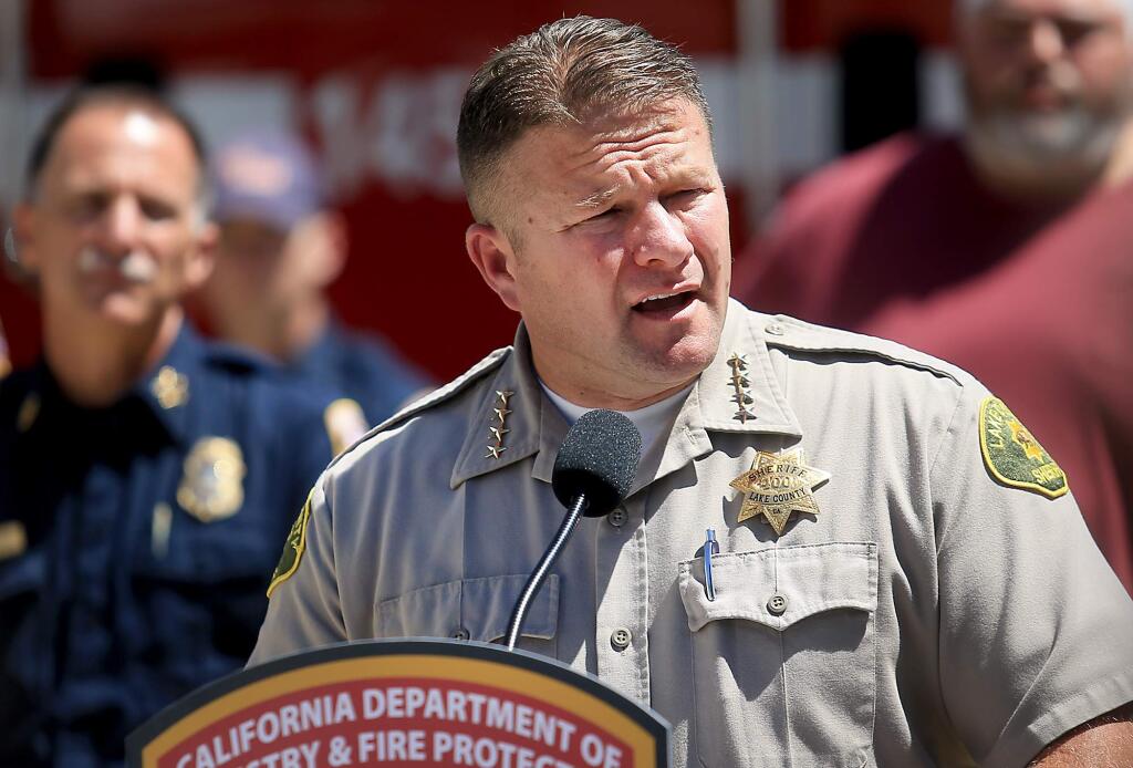 Lake County Sheriff Brian Martin speaks at a press conference as he and Cal Fire officials announce the cause of the Valley fire, Wednesday Aug. 10, 2016. (Kent Porter / The Press Democrat) 2016