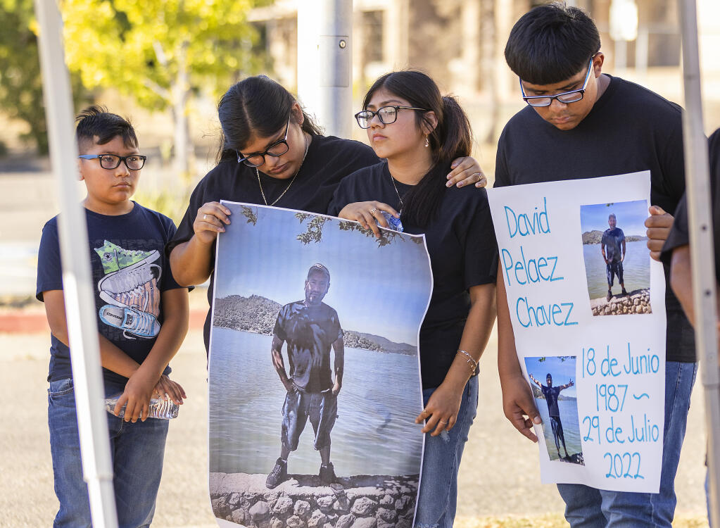 The nieces an nephews of David Pelaez Chavez, who was shot and killed by Sonoma County Sheriff’s deputies, listen to speakers at press conference in front of the Sheriff’s office, Monday, Aug. 22, 2022. (John Burgess/The Press Democrat file)