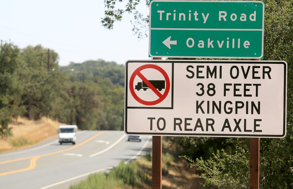 A sign on Highway 12 near Glen Ellen warns drivers of tractor trailer rigs that Trinity Road would not be a good shortcut in to the Napa Valley on Tuesday, Aug. 19, 2014. (KENT PORTER/ PD FILE)