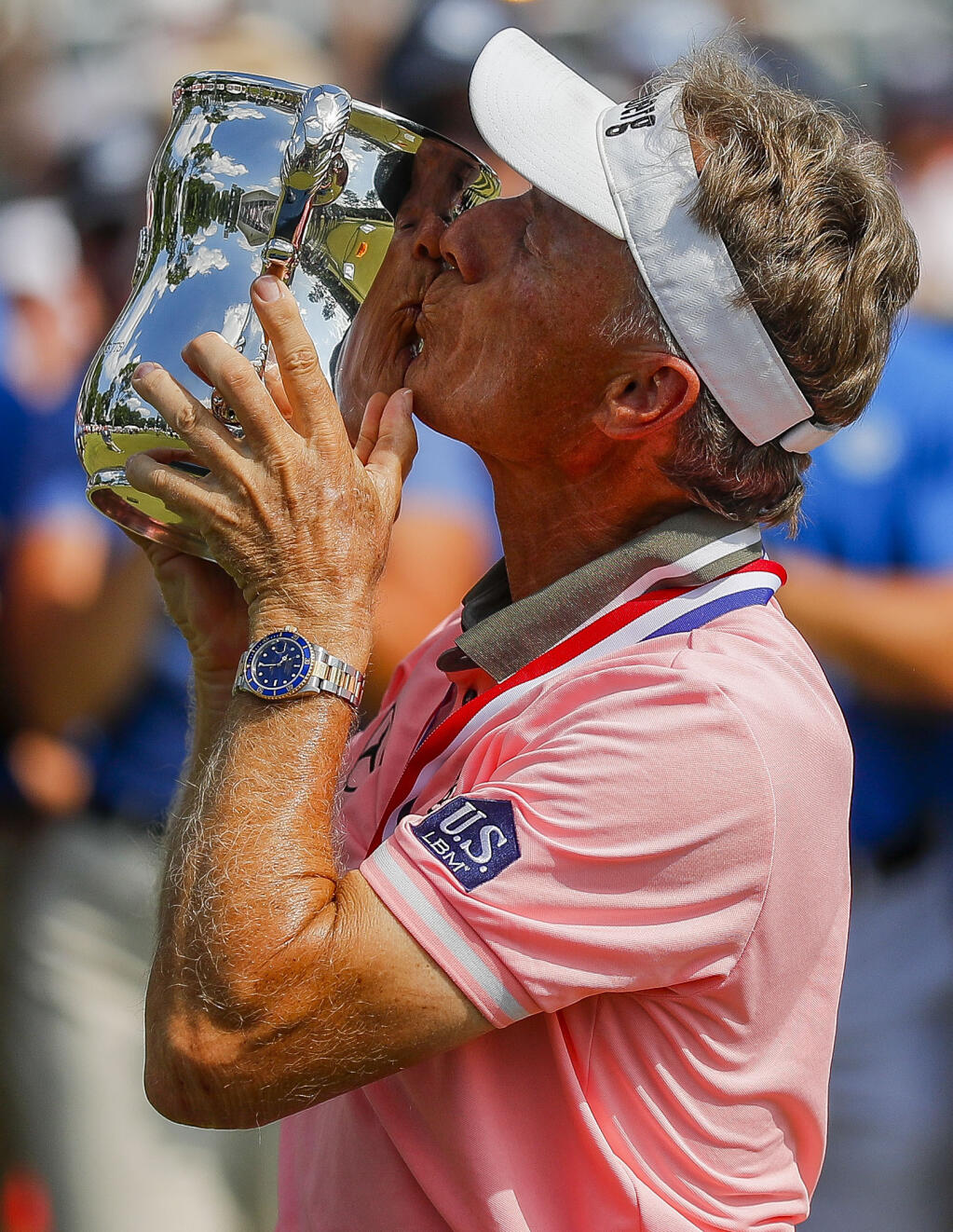 Bernhard Langer kisses the Francis D. Ouimet Trophy during the awards ceremony of the U.S. Senior Open golf tournament Sunday, July 2, 2023, in Stevens Point, Wis. (Tork Mason/The Post-Crescent via AP)