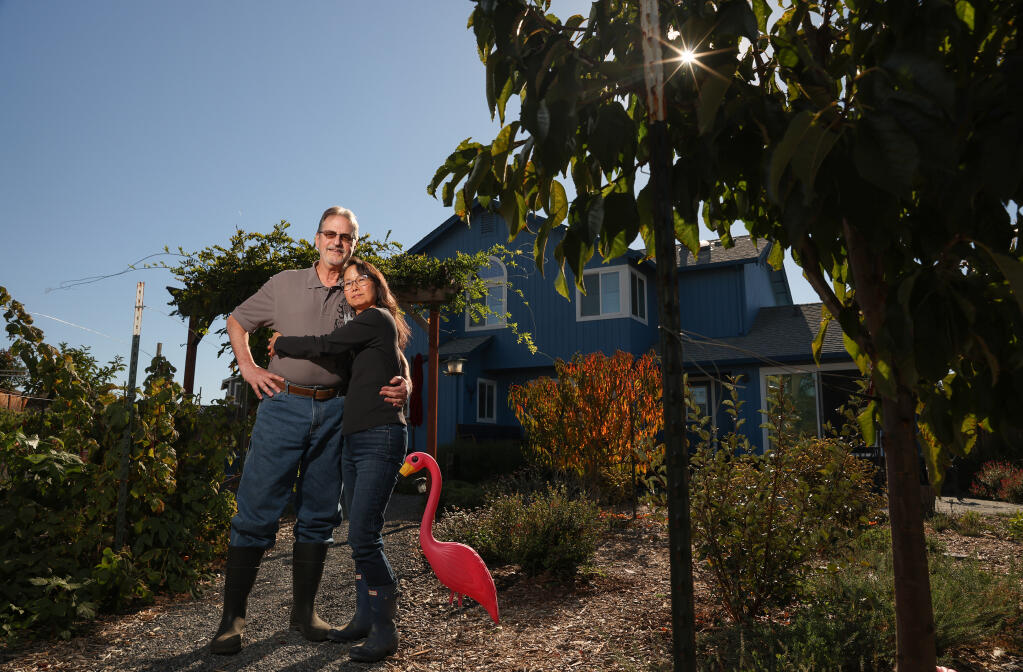 Richard and Alison Lane have rebuilt their landscaping in Coffey Park with a water-conserving food producing garden, after their property was destroyed by the Tubbs Fire. Their backyard previously consisted of a pool and manicured landscaping. Photo taken in Santa Rosa, Monday, Oct. 24, 2022. (Christopher Chung/The Press Democrat)