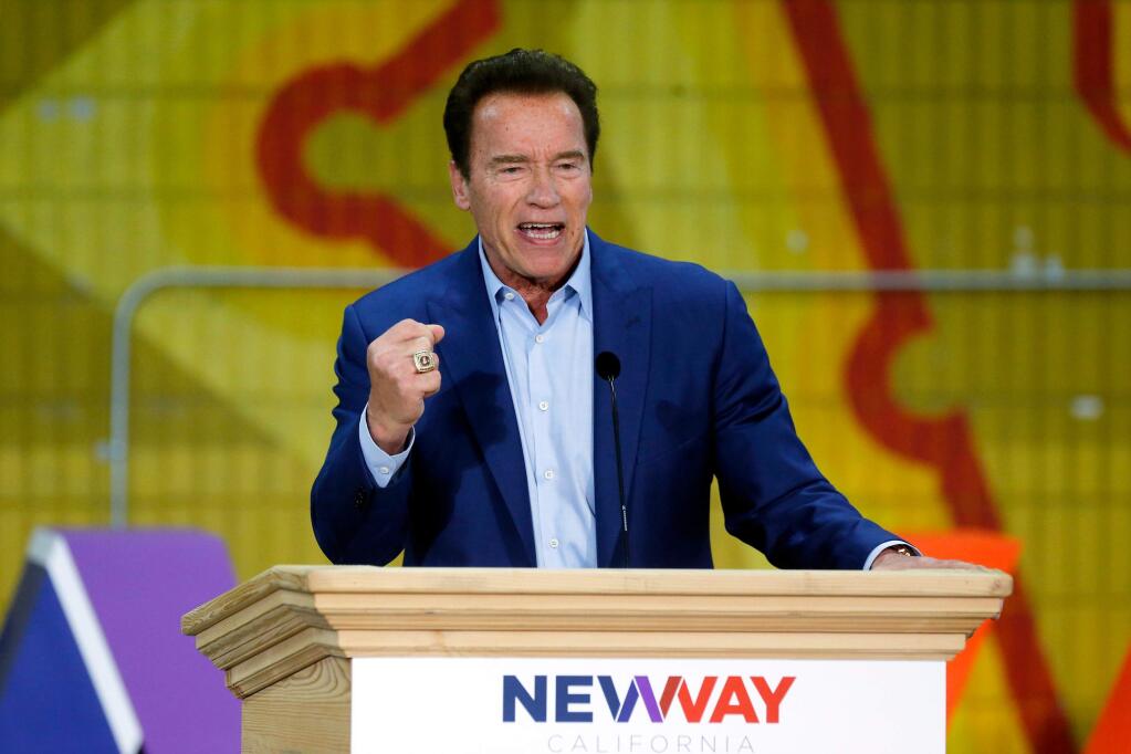 FILE - In this March 21, 2018 file photo, former California Gov. Arnold Schwarzenegger speaks at the first New Way California Summit in Los Angeles. Schwarzenegger is recovering in a Los Angeles hospital after undergoing heart surgery. He had a scheduled procedure to replace a pulmonic valve on Thursday, March 29, according to Schwarzenegger's spokesman. He is in stable condition. (AP Photo/Damian Dovarganes, File)