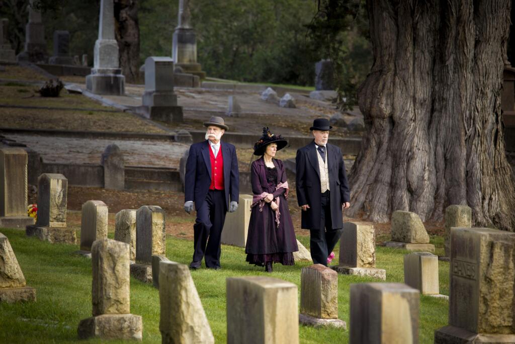 Those are not ghosts of Petaluma's past at the Cypress Cemetery. Once a year in October, Petalumans can experience a cemetery tour where historians dressed as prominent Petalumans from yesteryear show them their gravesites. Dressed as Lyman Byce is Leif Ortegren, as Addie Atwater is Sherri Ortegren and as John Augustus McNear is Jerry Pozo. (CRISSY PASCUAL/ARGUS-COURIER STAFF)