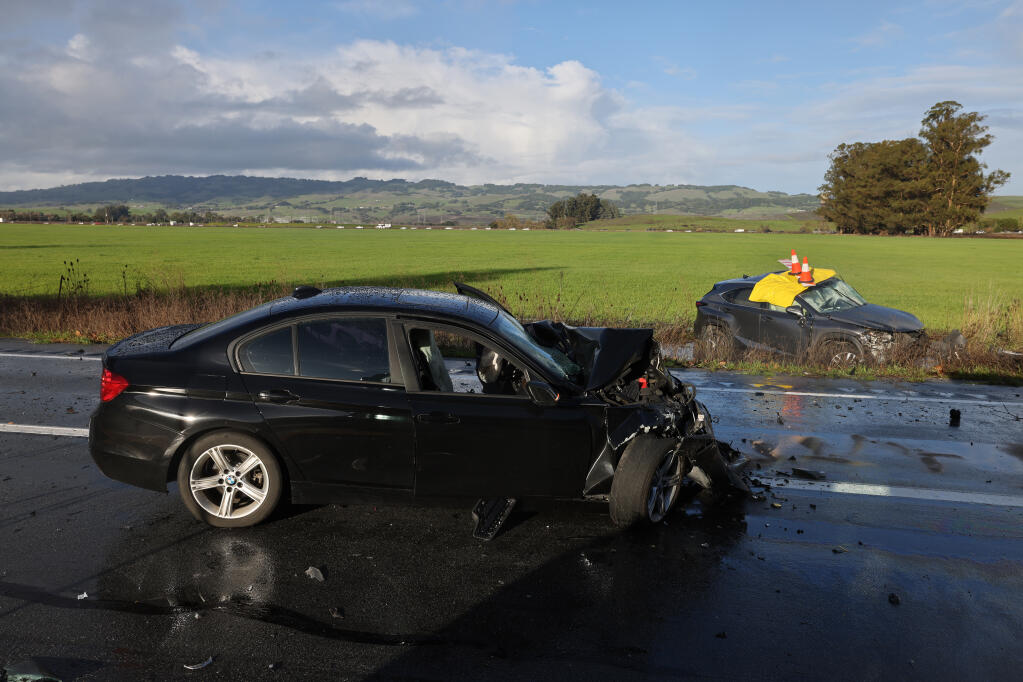 Police investigate a crash involving two vehicles on Lakeville Highway at Pine View Way in Petaluma, Thursday, Feb. 1, 2024. (Beth Schlanker / The Press Democrat file)