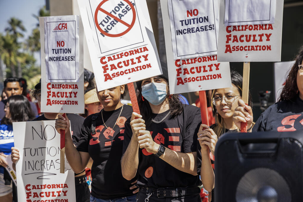 People attended a rally against tuition hikes, including students, instructors, and union members, at the California State University Chancellor’s office in Long Beach on July 11, 2023. Photo by Ted Soqui for CalMatters