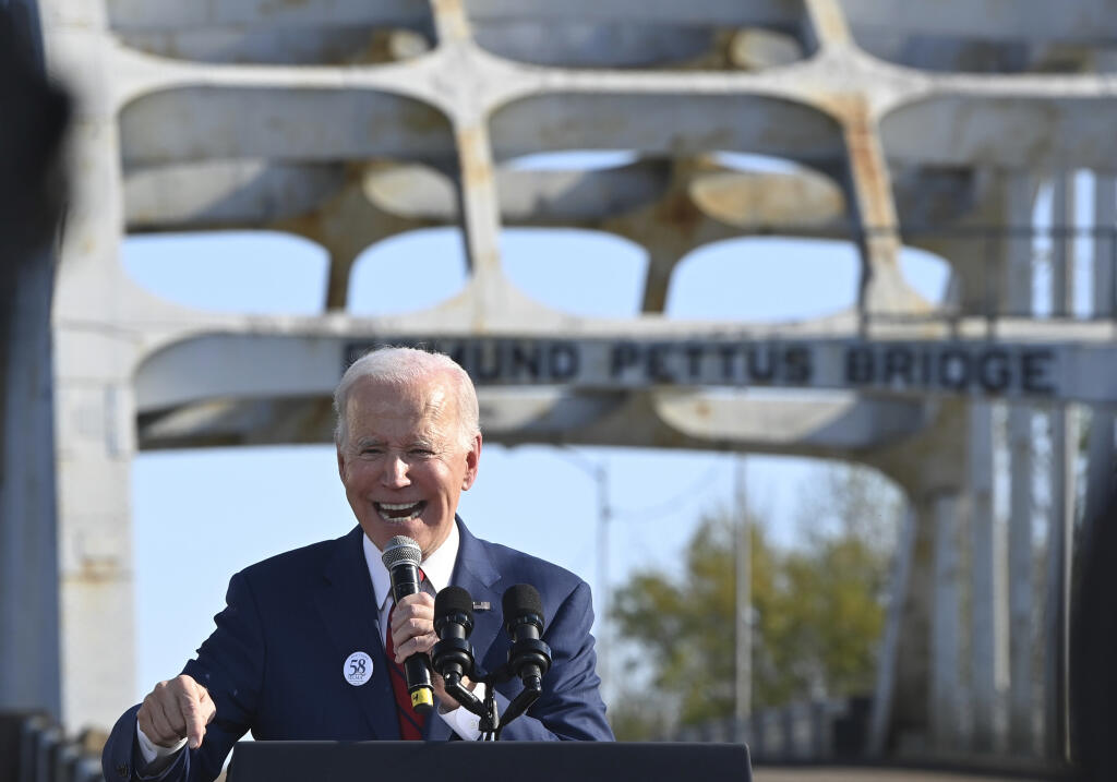 President Joe Biden speaks near the Edmund Pettus Bridge in Selma, Ala., Sunday, March 5, 2023, to commemorate the 58th anniversary of “Bloody Sunday,” a landmark event of the civil rights movement. (AP Photo/Julie Bennett)