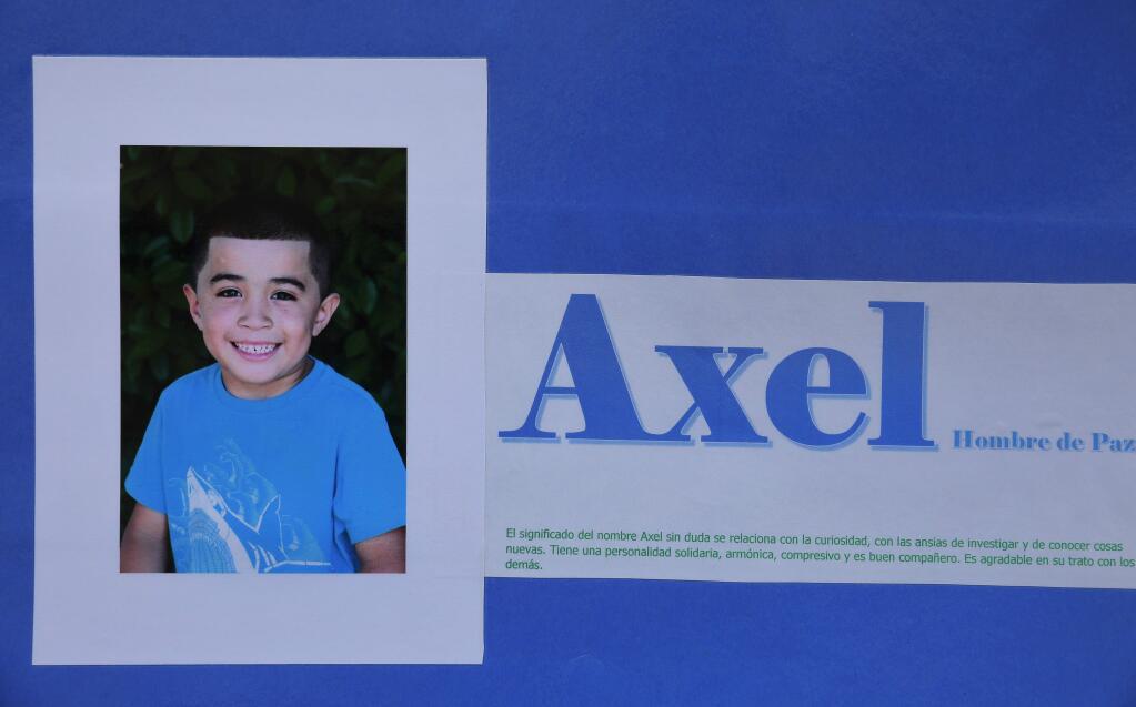A book put together by Axel Sanchez Medina's first-grade classmates and presented to his mother at Cesar Chavez Language Academy, in Santa Rosa on Monday, April 30, 2018. (Christopher Chung/ The Press Democrat)