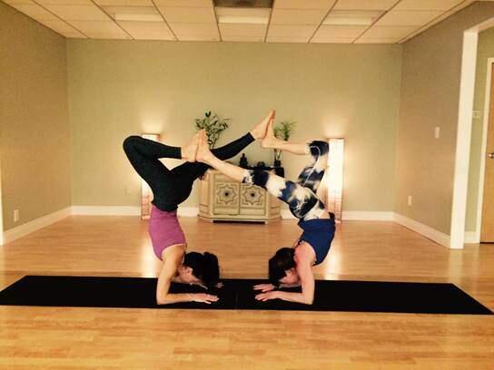Challenge yourself with arm balances and inversions in a Yum Yum Yoga class. (Courtesy of Bekka Adair)