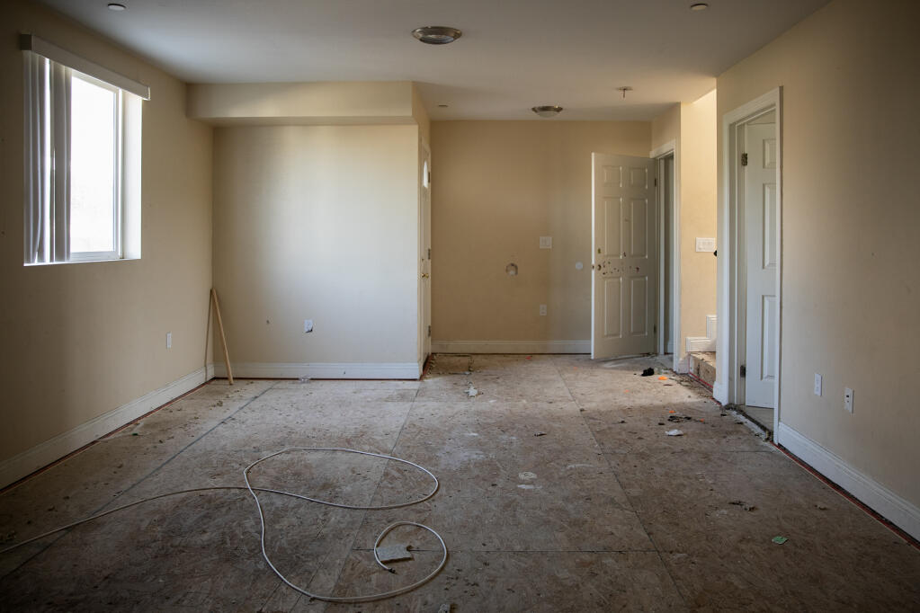 The inside of one of several properties managed by Norris Jones and Dejon Dixon, co-founders of Housing 1BY1, in Los Angeles on Sept. 28, 2023. Dixon and Jones say a Los Angeles-based nonprofit owes them thousands of dollars in unpaid rent for housing people experiencing homelessness. Some of the tenants left properties damaged or stole items before being evicted, according to Jones and Dixon. Photo by Adriana Heldiz, CalMatters