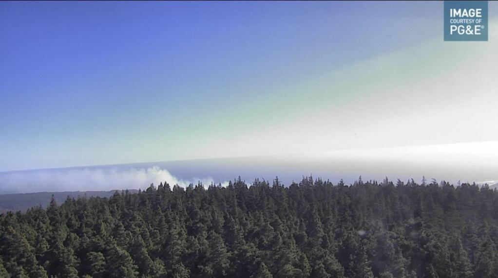 This image shows smoke from a wife along Highway 1, south of Point Arena, in Mendocino County Friday, May 20, 2022. (Alert Wildfire camera)