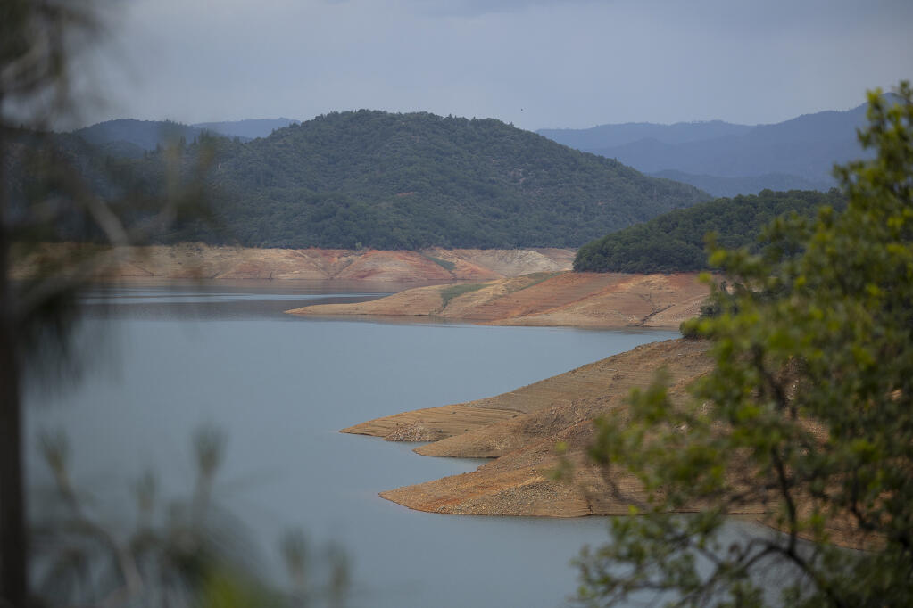 Low water levels at Shasta Lake on April 25, 2022. The reservoir as of Feb. 21 , 2023 was at more than 86% of historic average levels. Photo by Miguel Gutierrez Jr., CalMatters