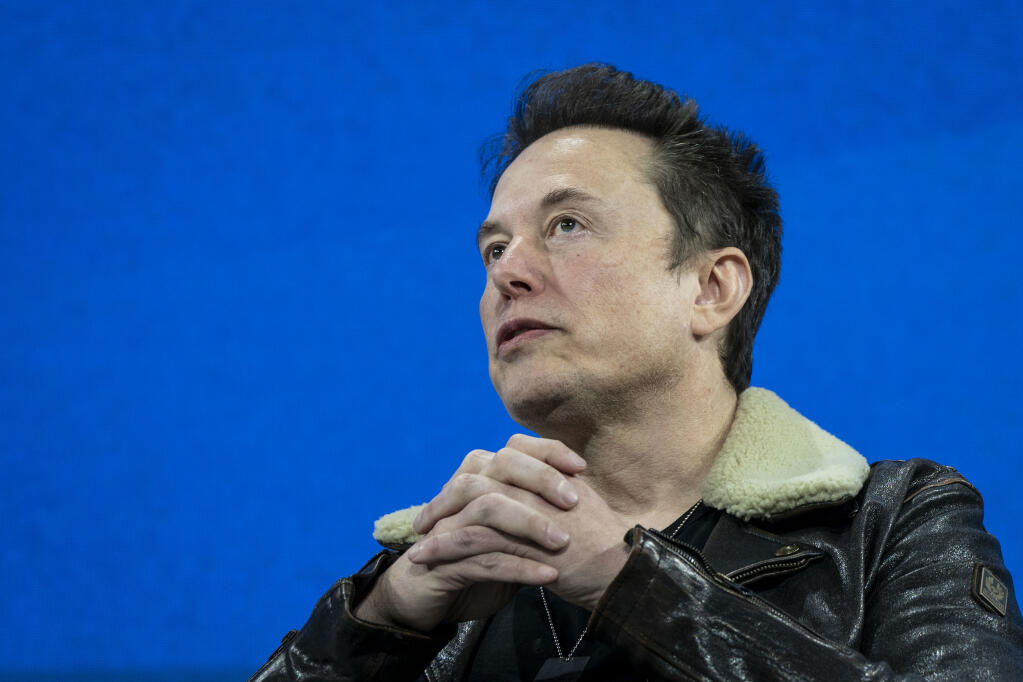 FILE — Elon Musk, who purchased Twitter and rebranded it as X, at a conference in New York, Nov. 29, 2023. Musks’ early election-year attacks on the American voting system have raised alarms among civil rights lawyers, election administrators and Democrats, with President Joe Biden’s campaign calling the billionaire’s posts “profoundly irresponsible.” (Haiyun Jiang/The New York Times)