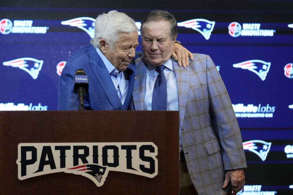 New England Patriots team owner Robert Kraft, left, and former Patriots head coach Bill Belichick embrace during an NFL football news conference, Thursday, Jan. 11, 2024, in Foxborough, Mass., to announce that Belichick, a six-time NFL champion, has agreed to part ways with the team. (AP Photo/Steven Senne)