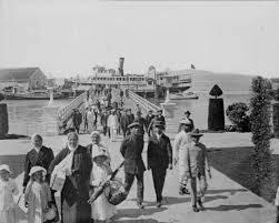 Immigrants enter California at Angel Island at the turn of the 20th century. Immigration to the Golden State became a primary driver for the economy.
