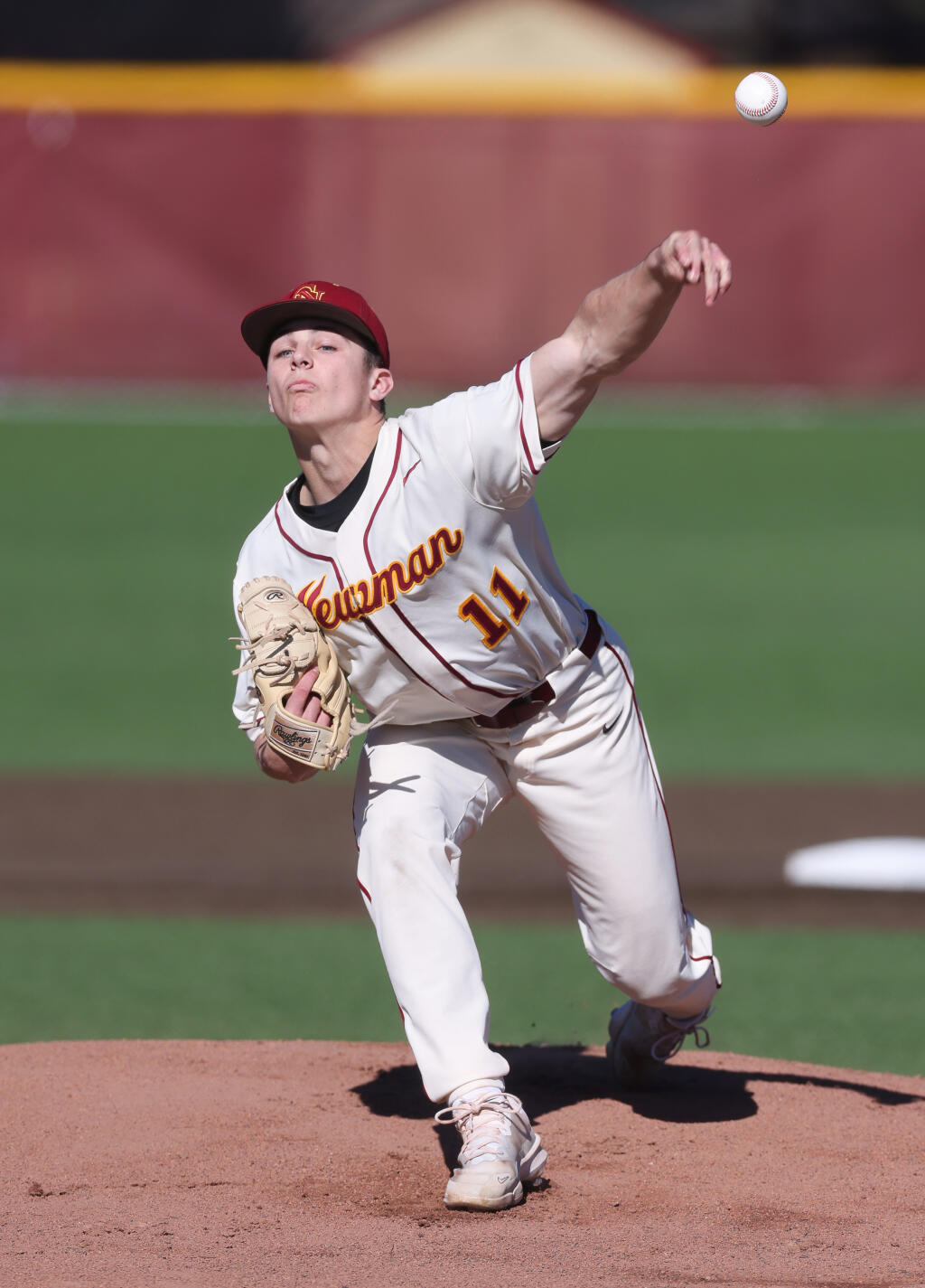 Cardinal Newman pitcher Jack Pezzolo delivers a pitch against Berkeley during their game in Santa Rosa on Thursday, March 14, 2024. (Christopher Chung/The Press Democrat)