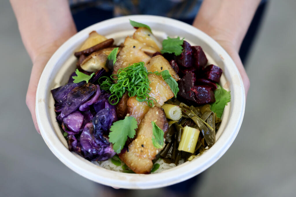 Jasmine rice bowl with pork belly, beets, house fermented cabbage, mushrooms  and miso sauce at Allikai Eatery in Sonoma, Thursday, April 4, 2024. (Beth Schlanker / The Press Democrat)