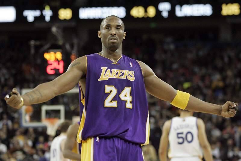 Los Angeles Lakers guard Kobe Bryant gestures to the crowd after nailing a shot against the Golden State Warriors in Oakland on Wednesday, Jan. 12, 2011. The Warriors lost to the Lakers 115-110. (Christopher Chung/ The Press Democrat)