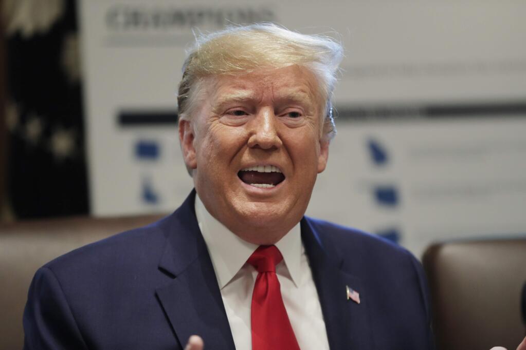 President Donald Trump speaks during a Cabinet meeting in the Cabinet Room of the White House, Monday, Oct. 21, 2019, in Washington. (AP Photo/Pablo Martinez Monsivais)