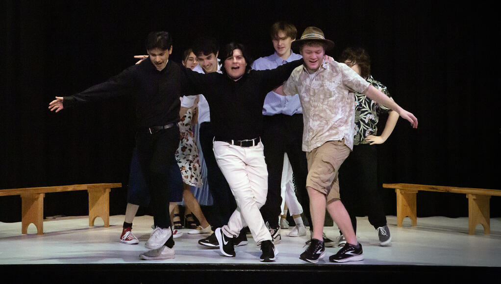 From left in foreground, Emmanuel Gomez, Mario Alioto and Quinn Gamble perform in Sonoma Valley High School’s production of “Mamma Mia!“ a romantic-comedy musical based on the songs of the Swedish group ABBA. Photo taken at a dress rehearsal on Tuesday, Feb. 20, 2024. (Robbi Pengelly/Index-Tribune)