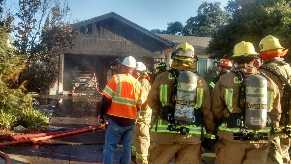 A fire damaged two homes Friday in the 100 block of Robinson Court in Healdsburg. Two families were displaced in the blaze, but no injuries were reported.