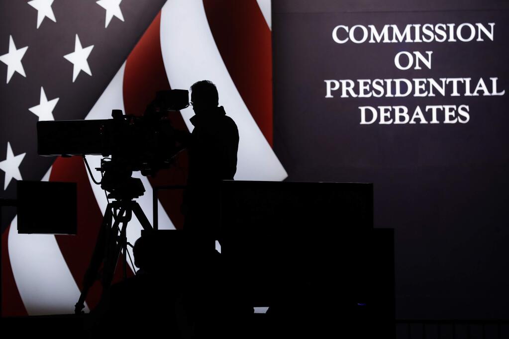 A television camera operator tests his position during a rehearsal for the third presidential debate between Republican presidential nominee Donald Trump and Democratic presidential nominee Hillary Clinton at UNLV in Las Vegas, Tuesday, Oct. 18, 2016. (AP Photo/Patrick Semansky)