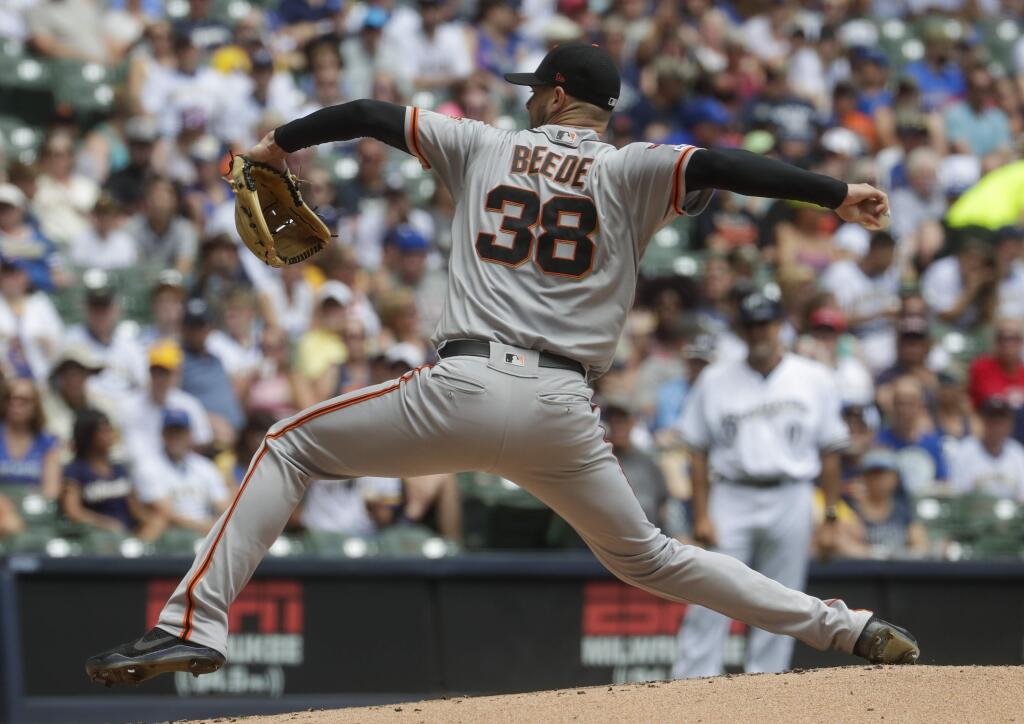 San Francisco Giants starter Tyler Beede throws during the first inning of a baseball game against the Milwaukee Brewers Sunday, July 14, 2019, in Milwaukee. (AP Photo/Morry Gash)
