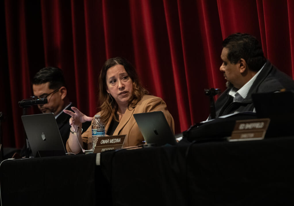 Santa Rosa City Schools Board Superintendent Anna Trunnell, talks to President Omar Medina, during a special meeting on student progress in meeting A-G requirements Wednesday Dec. 20, 2023 at the Santa Rosa High School Auditorium. (Chad Surmick / The Press Democrat)