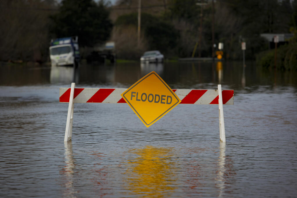 The recent rainstorms caused the flooding of North Petaluma Boulevard and Stony Point Road in Petaluma,, which had to be closed to traffic on Monday, January 9, 2023. (CRISSY PASCUAL/ARGUS-COURIER STAFF)