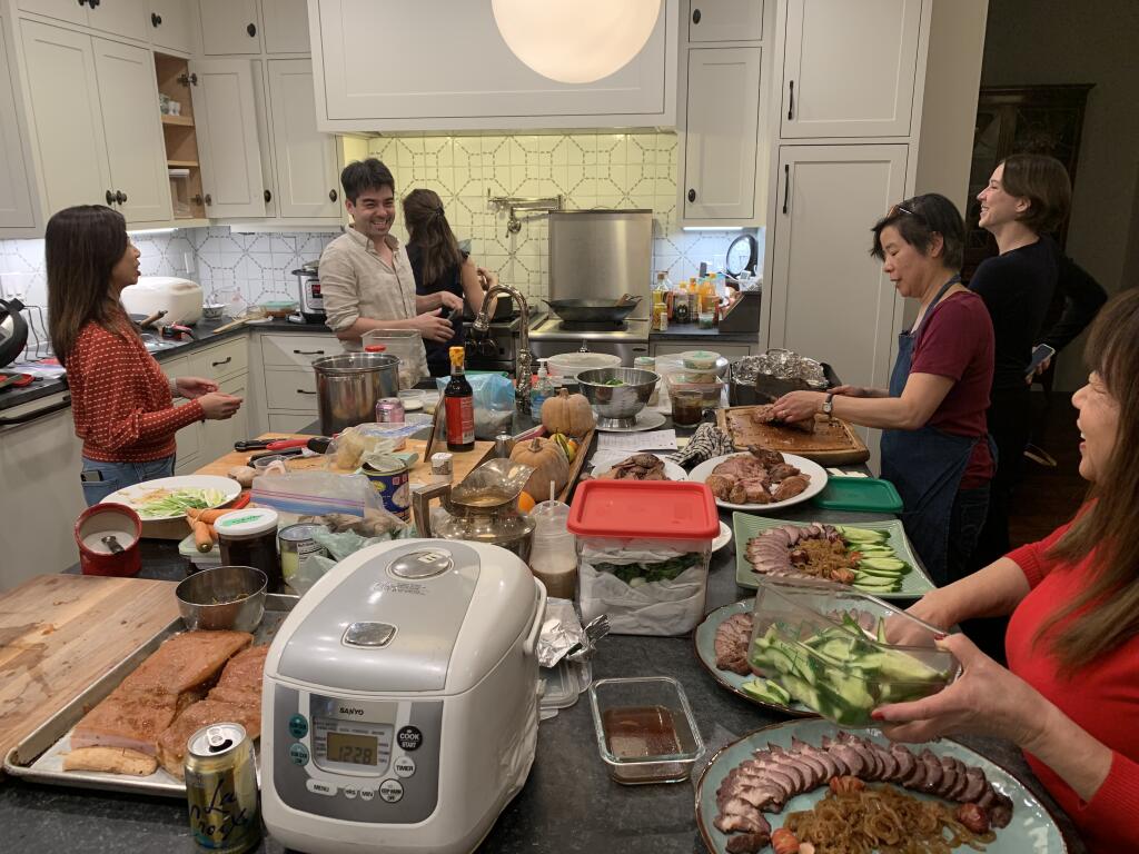 Vanessa Wong (third from right), winemaker at Peay Vineyards, prepares a feast for 36 people in celebration of Lunar New Year. (Peay Vineyards)