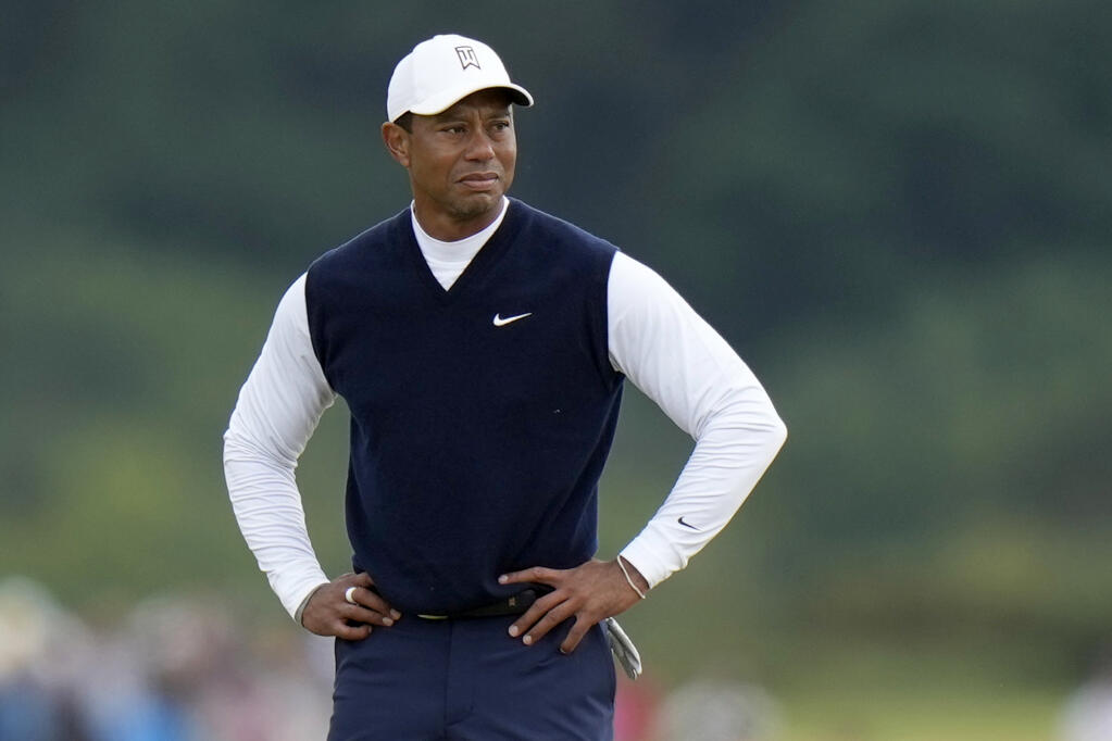 Tiger Woods stands on the 11th hole during the first round of the British Open on July 14, 2022, at St. Andrews, Scotland. (Alastair Grant / ASSOCIATED PRESS)