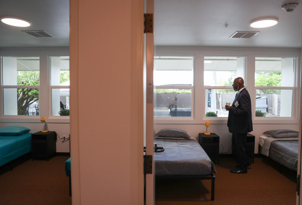 Dennis McCray, Center Point Inc. senior vice president, tours the bedrooms at the Center Point DAAC facility in Santa Rosa, Friday, April 26, 2024. (Christopher Chung / The Press Democrat)