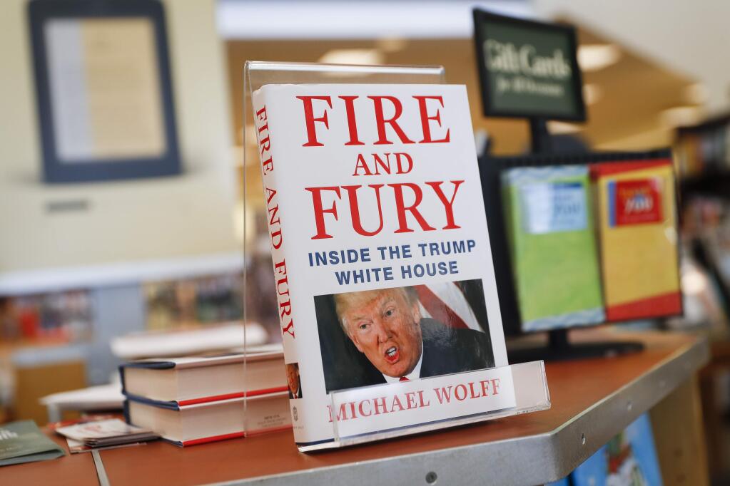 Three remaining copies of the book 'Fire and Fury: Inside the Trump White House' by Michael Wolff are displayed at a Barnes & Noble store, Friday, Jan. 5, 2018, in Newport, Ky. (AP Photo/John Minchillo)