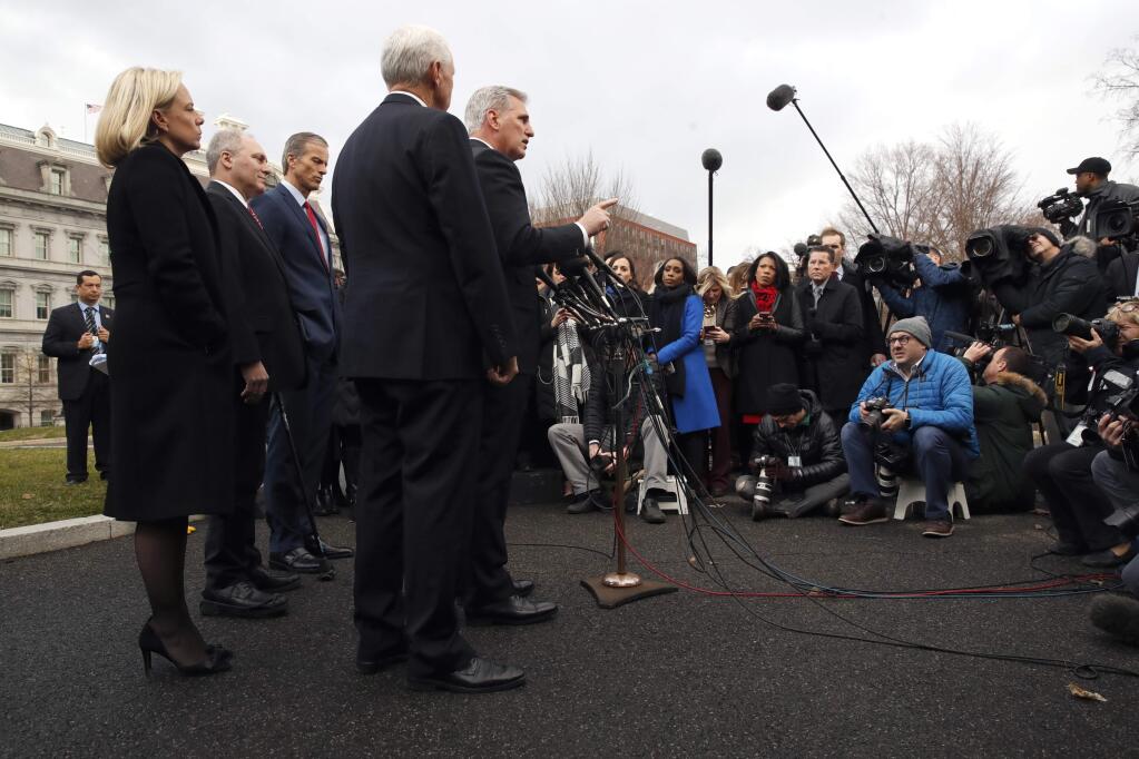 House Minority Leader Kevin McCarthy of Calif., speaks as from left, Homeland Security Secretary Kirstjen Nielsen, House Minority Whip Steve Scalise of La., Sen. John Thune, R-S.D., and Vice President Mike Pence listen after meeting with President Donald Trump and Democratic leaders on border security in the Situation Room, Wednesday Jan. 9, 2019, at the White House in Washington, as the government shutdown continues. (AP Photo/Jacquelyn Martin)