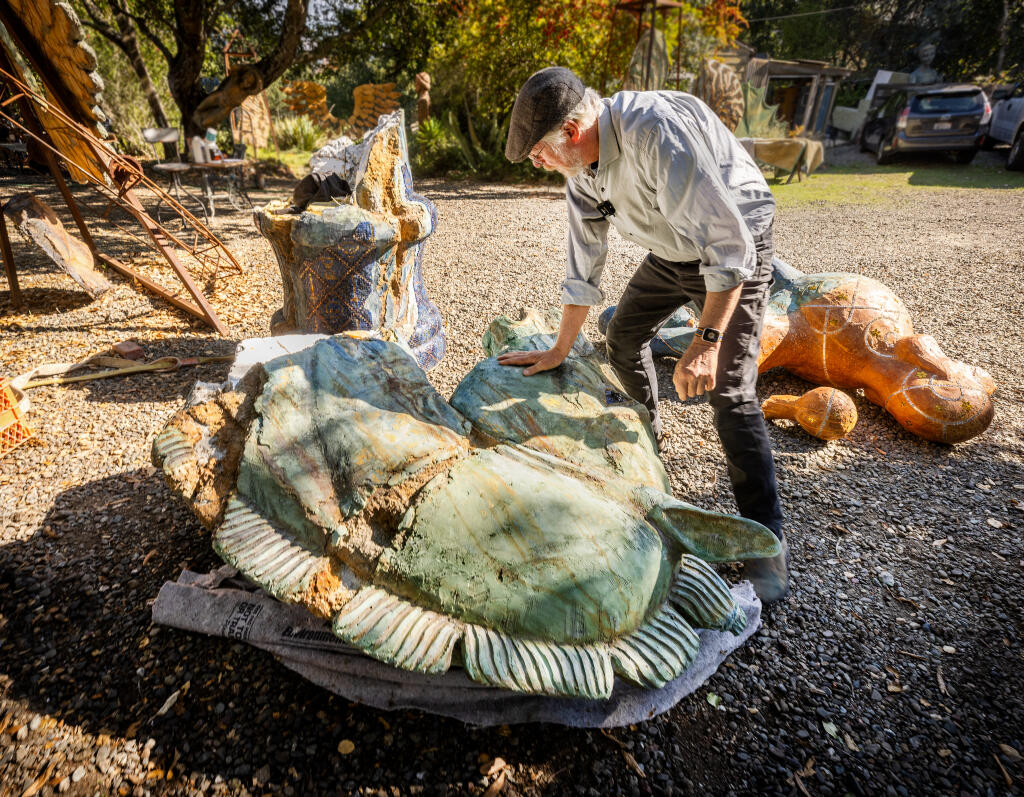 Artist Peter Crompton says it will takes weeks to repair the concrete and Styrofoam on two sculptures damaged by vandals while displayed along the Cloverdale Sculpture Trail. Crompton now has the sculptures at his Santa Rosa home studio, Tuesday, Oct. 31, 2023.  (John Burgess / The Press Democrat)