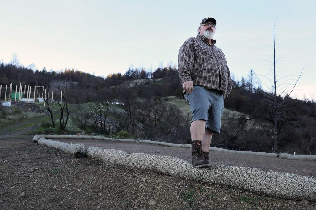 Michael McDonald was burned out of his property, along Mariposa Creek Road, in the October 2017 wildfires. He visits the property once a week, while living in Willits, to work on rehabilitating the property. (Christopher Chung/ The Press Democrat)