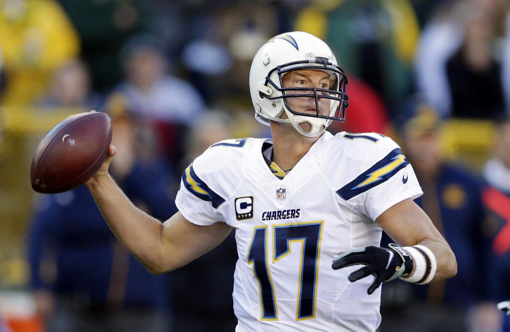 San Diego Chargers quarterback Philip Rivers (17) throws during the first half of an NFL football game against the Green Bay Packers, Sunday, Oct. 18, 2015, in Green Bay, Wis. (AP Photo/Darron Cummings)