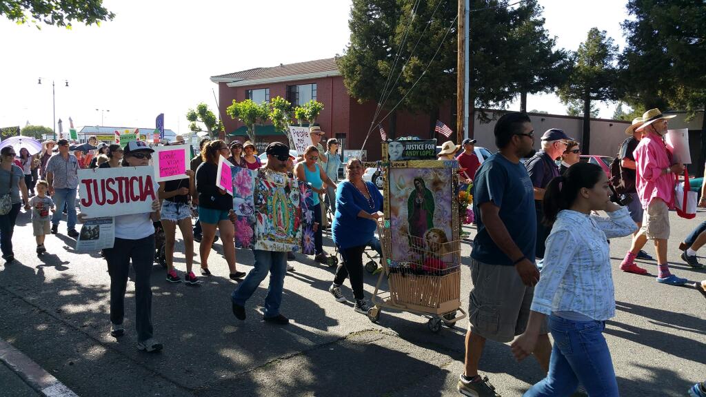 Demonstrators march in the annual May Day parade in Santa Rosa on Friday, May 1, 2015. (Martin Espinoza/PRESS DEMOCRAT)