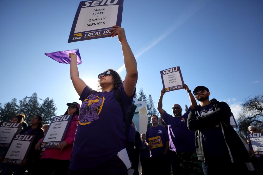 Debra Barrios, joins Sonoma County employees at a rally with organizers from the SEIU outside the Board of Supervisors meeting in Santa Rosa, Calif., Tuesday, Jan. 24, 2023. (Beth Schlanker/The Press Democrat)