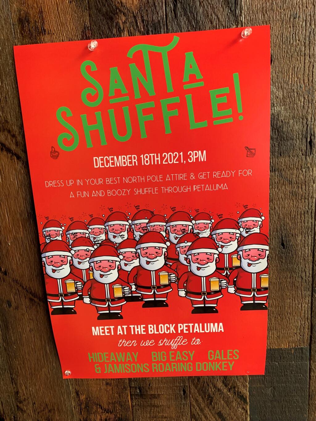 If you see dozens of Santas meandering around downtown Petaluma this Saturday, chances are good they are participating in the Santa Shuffle. (DAVID TEMPLETON/ARGUS-COURIER STAFF)