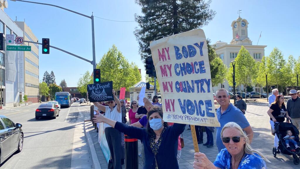 People gather at Old Courthouse Square in Santa Rosa, May 3, 2022, as part of the Indivisible Sonoma County abortion rights rally in response to a leaked draft U.S. Supreme Court decision that indicates Roe v. Wade will be overturned. (Kent Porter / The Press Democrat)
