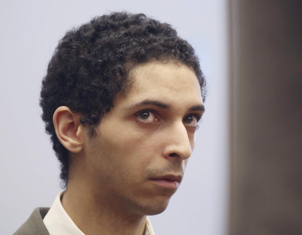 FILE - In this May 22, 2018, file photo, Tyler Barriss, of California, appears for a preliminary hearing in Wichita, Kan. Barriss, who pleaded guilty to 51 charges related to fake emergency calls and threats will be sentenced in federal court in Wichita, Friday, March 29, 2019, and could face decades in prison. His case drew national attention to the practice of 'swatting,' a form of retaliation in which gamers get police to go to an online opponent's address. One hoax emergency call by Barris led police to fatally shoot a Kansas man. (Bo Rader/The Wichita Eagle via AP, File)