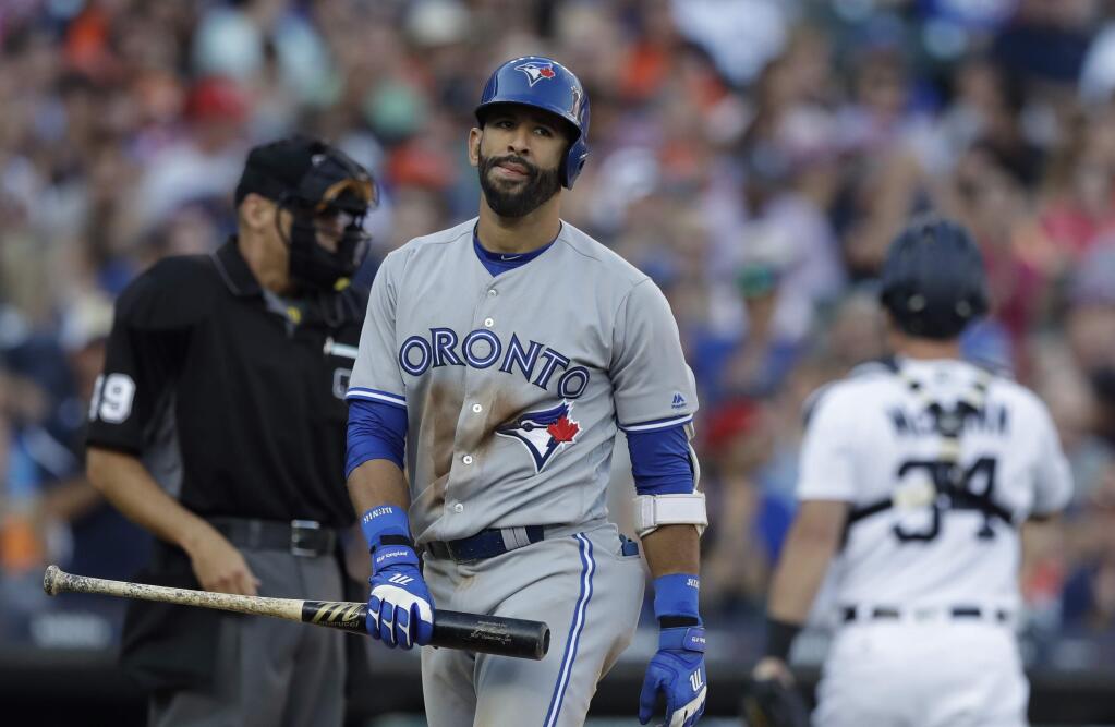 The Toronto Blue Jays' Jose Bautista walks to the dugout after striking out to end the sixth inning of a game against the Detroit Tigers, Saturday, July 15, 2017, in Detroit. (AP Photo/Carlos Osorio)