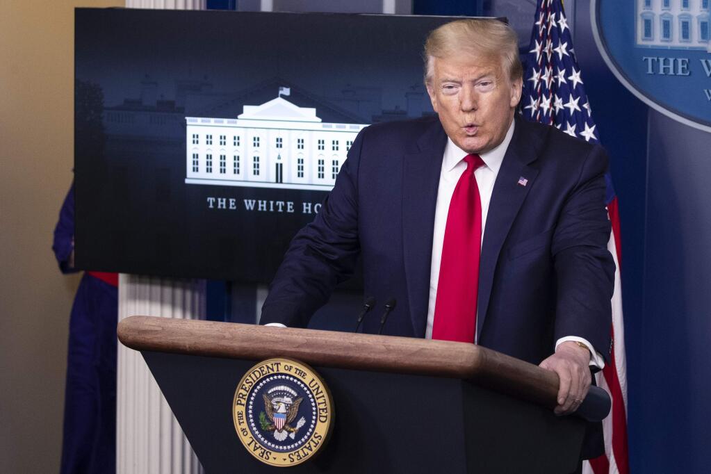 President Donald Trump speaks with reporters about the coronavirus in the James Brady Press Briefing Room of the White House, Friday, May 22, 2020, in Washington. (AP Photo/Alex Brandon)