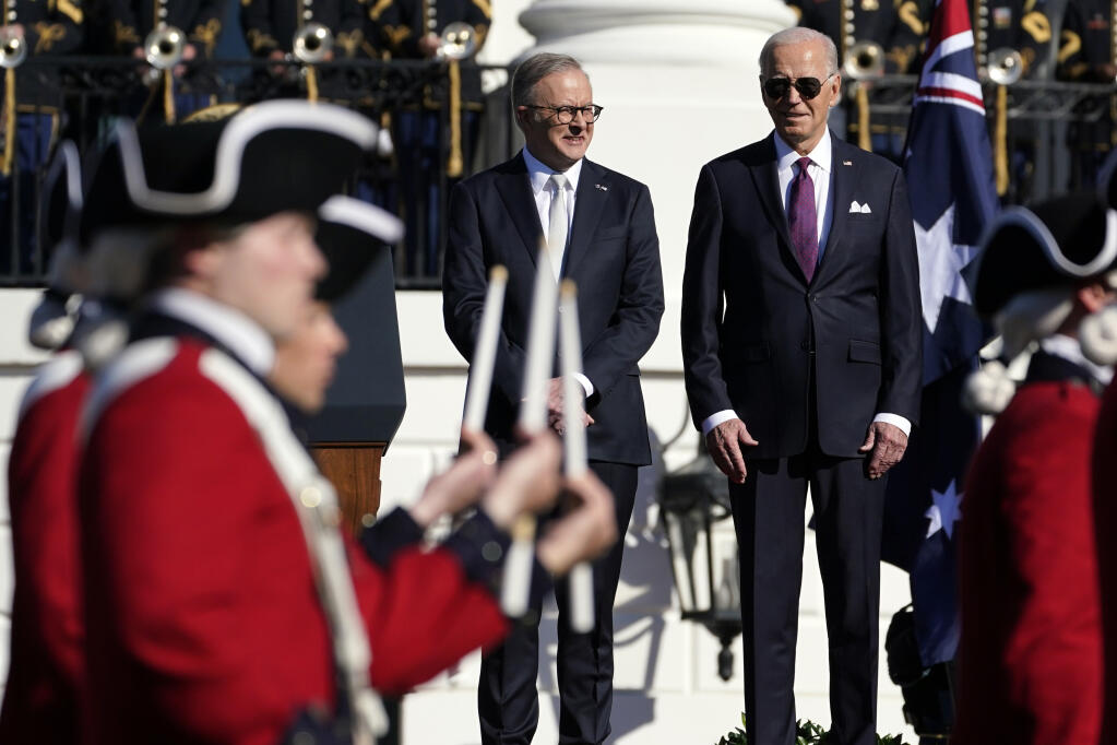 President Joe Biden and Australia's Prime Minister Anthony Albanese watch the United States Army Old Guard Fife and Drum Corps during a State Arrival Ceremony on the South Lawn of the White House Wednesday, Oct. 25, 2023, in Washington. (AP Photo/Evan Vucci)